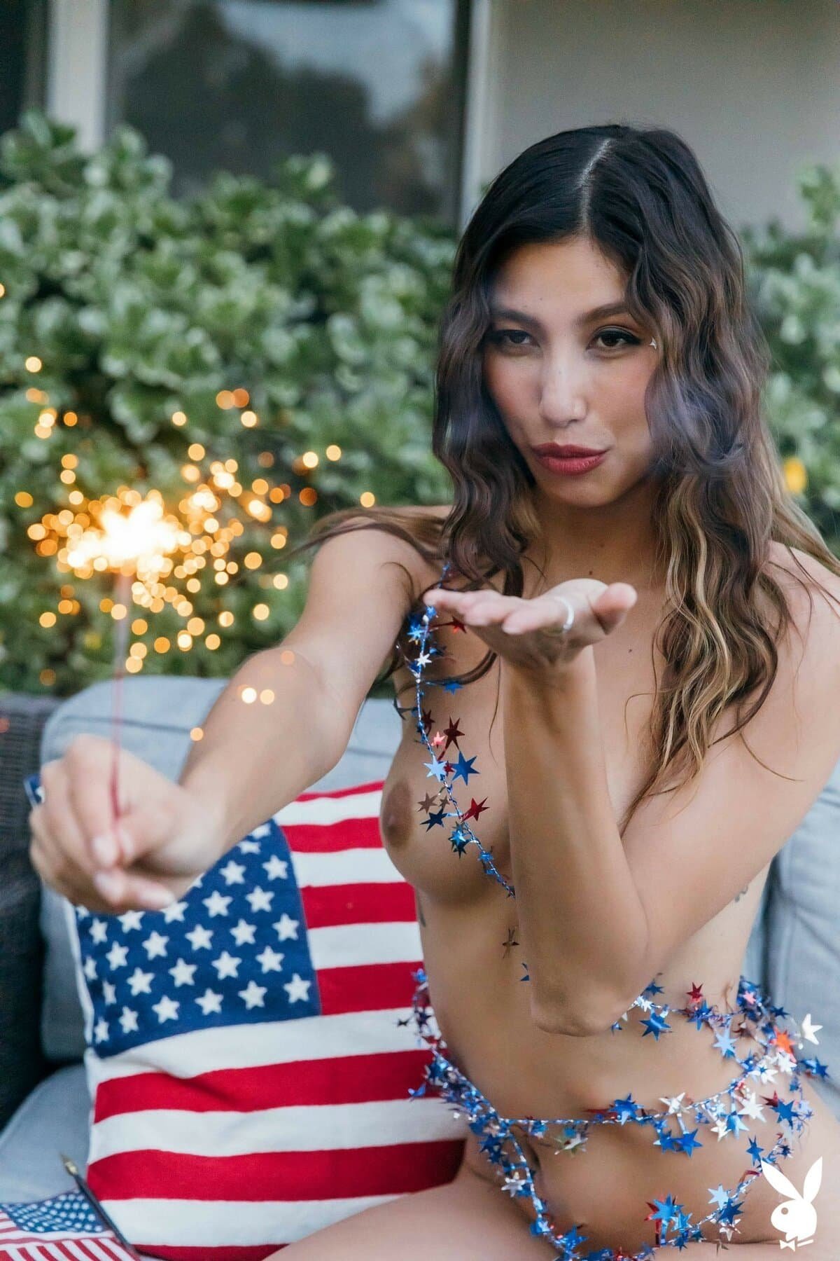 Dominique Lobito getting naked in the celebration of Independence Day for Playboy
