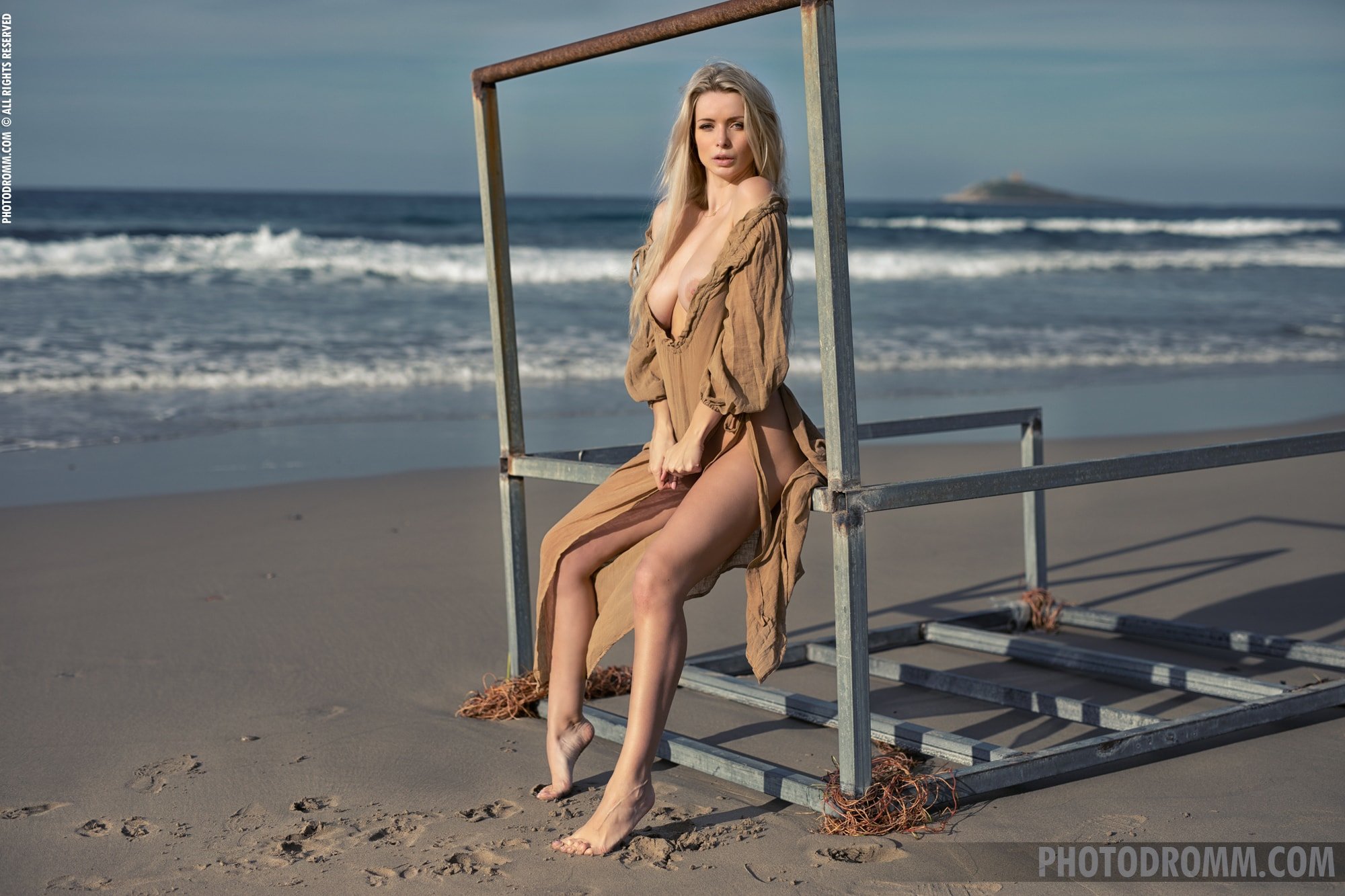 Stunning Katya exposes her big breasts on the beach