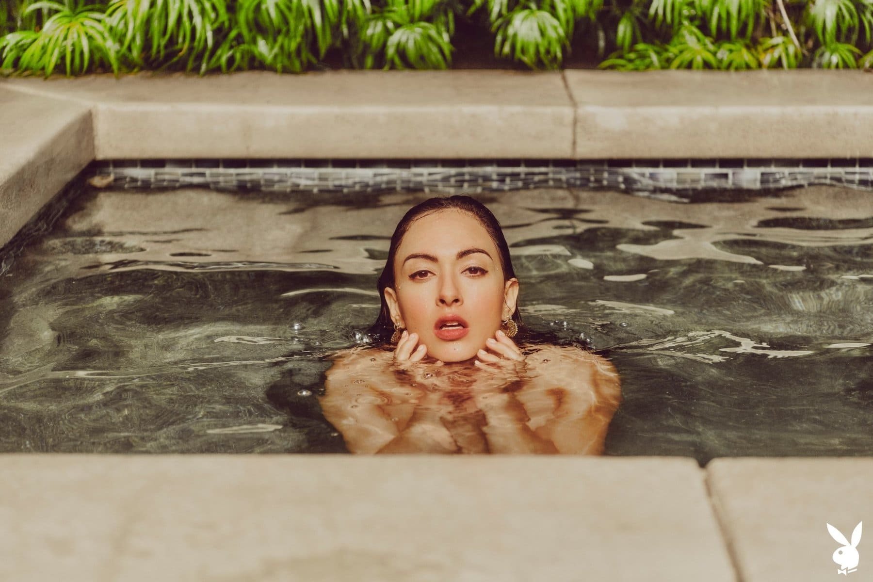 Genevieve Liberte dips her perfect natural figure in the pool