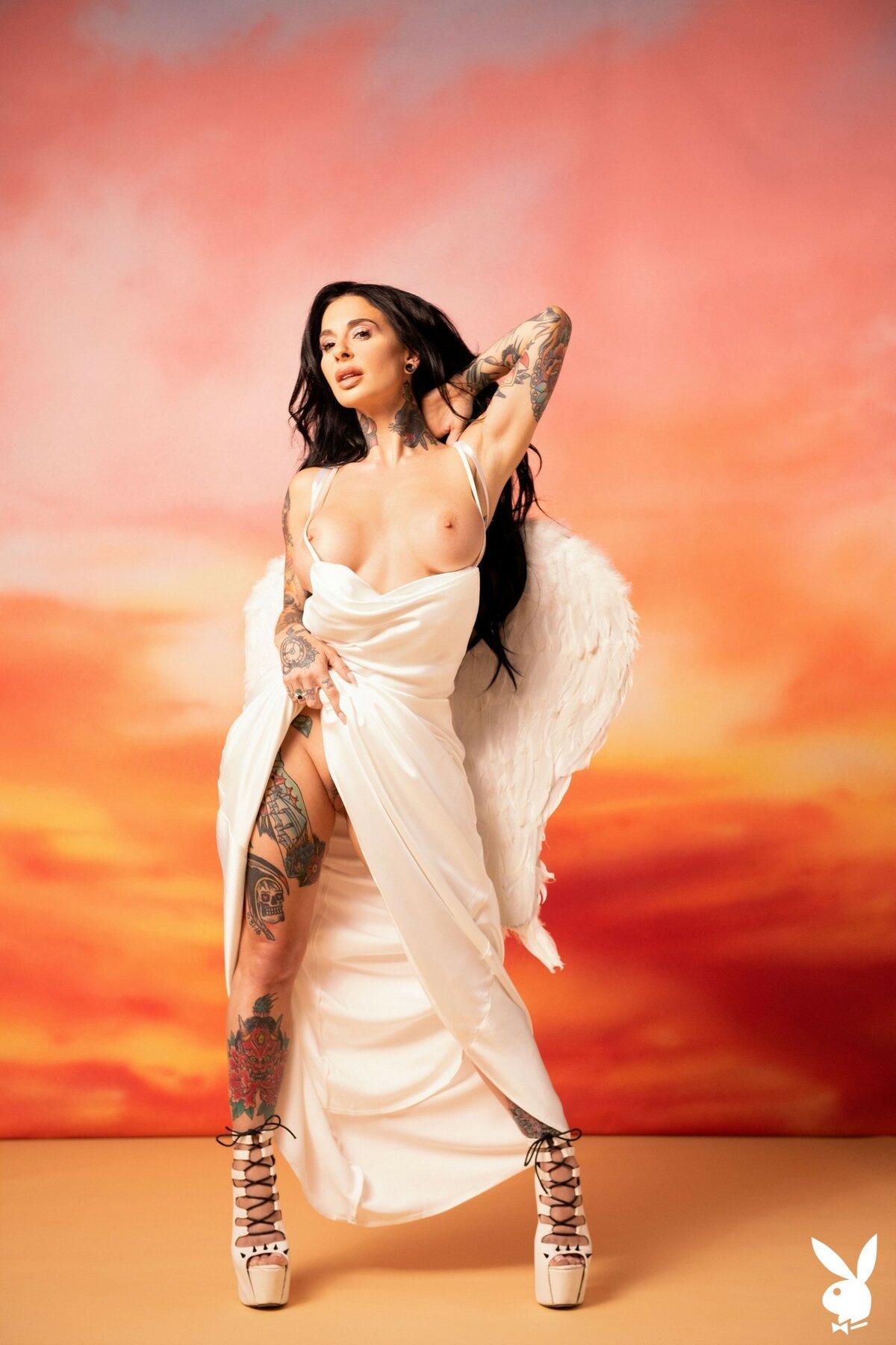 Joanna Angel is revealing all her tattoos wearing angel-wings