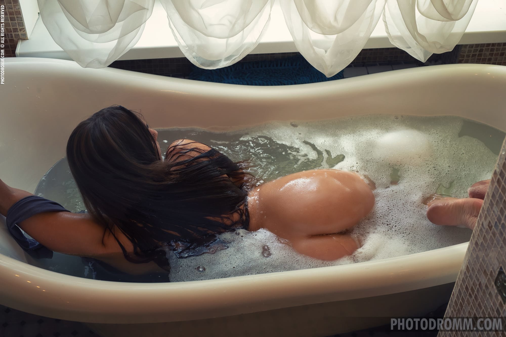 Magnificent Josephine removes her skin tight dress in the bath tub