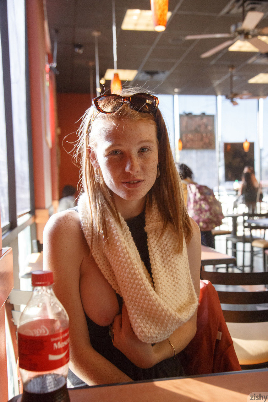 Cute teen with freckles Abby Vissers shows her natural tits at public places