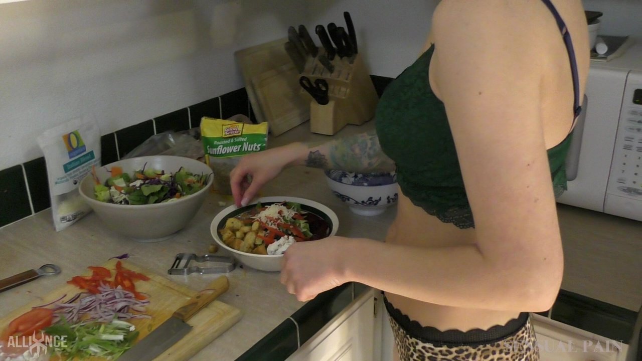 Solo girl Abigail Dupree sports a buzz cut while making a salad in pretties