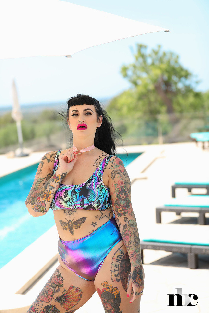 Inked fatty Cherrie Pie loses her bra and undies and flaunts her hot curves