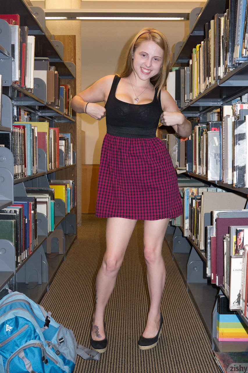 Redhead college girl Danica Ensley flashes her upskirt panties on campus