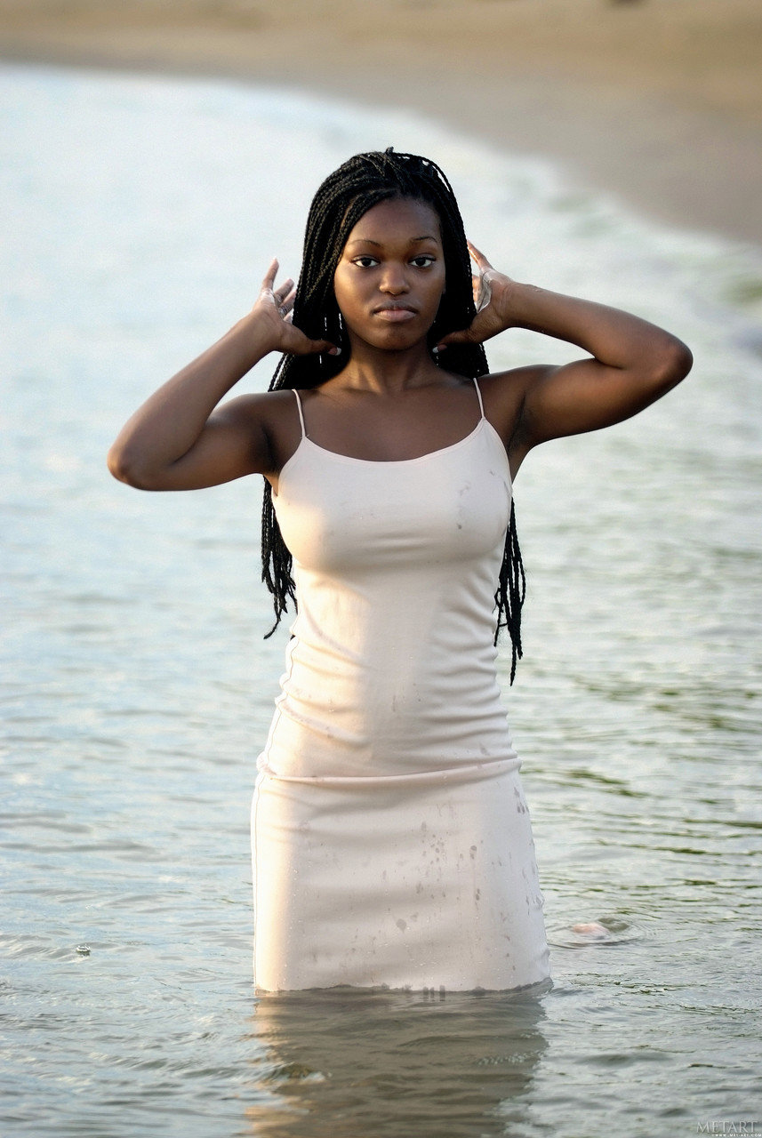 African beauty Deserea A reveals her juicy tits and poses on the beach