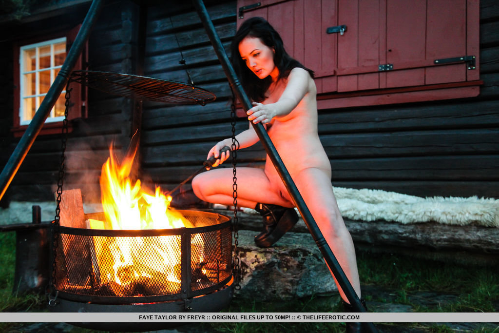 Faye Taylor flaunts her delectable body by the fire pit