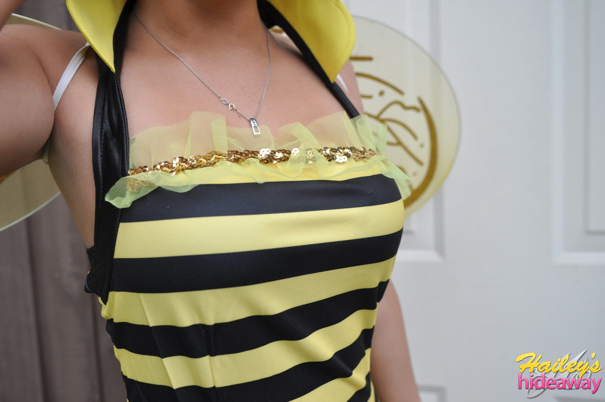 Sexy young amateur Hailey strips her bumble bee costume to show her small ass