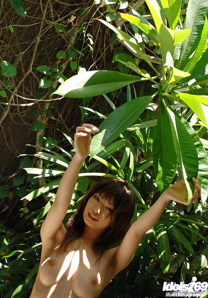 Asian coed with awesome tits Hikari Hino posing topless outdoor