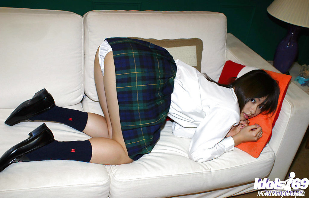 Naughty asian schoolgirl Hikaru Koto slipping off her uniform