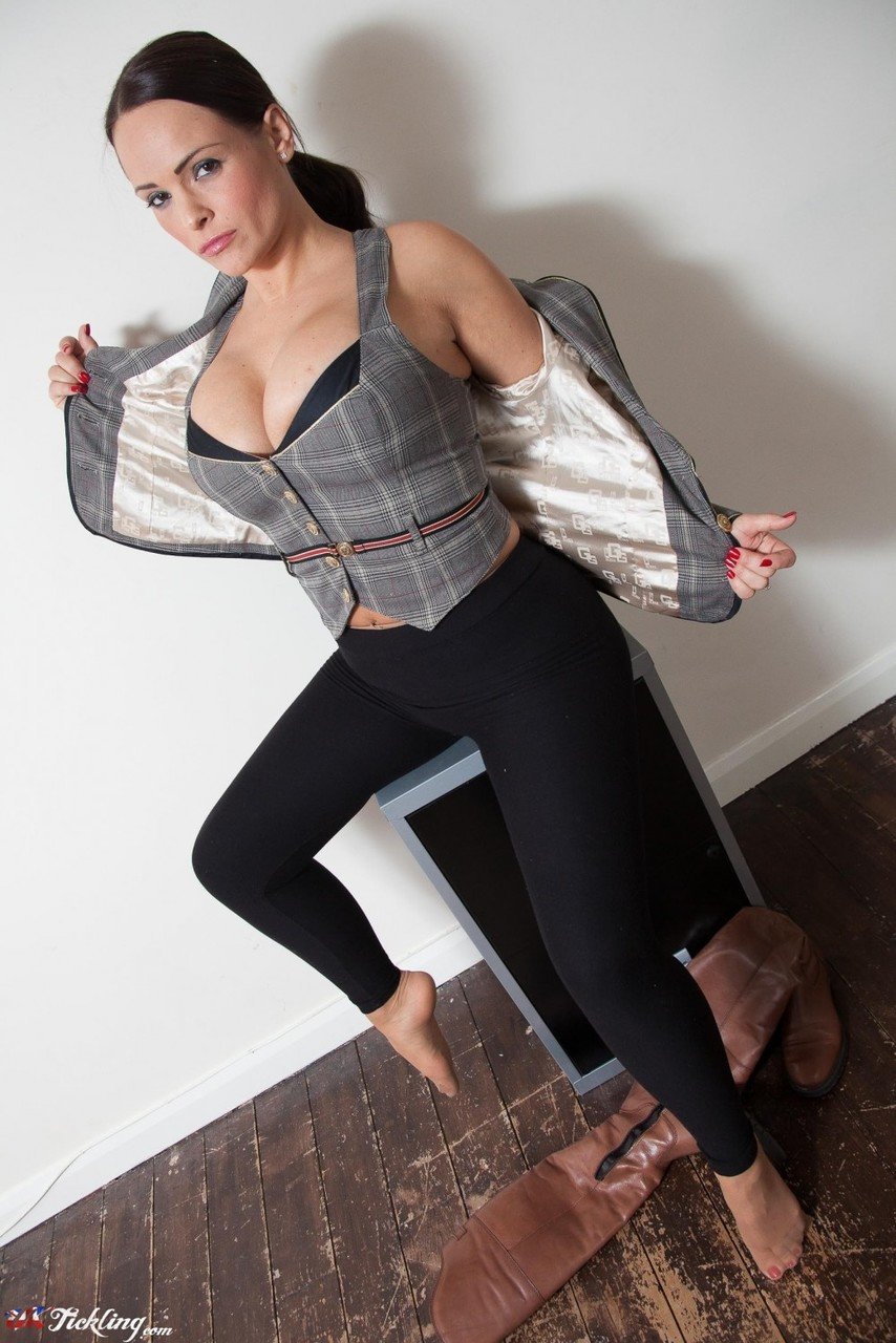 UK model Holly Mcguire sets her big tits free wearing black leggings