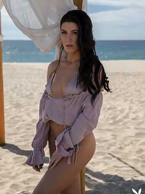 Carmen Nikole loves taking off her bikini on the beach
