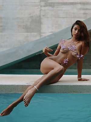 Mexican babe Carolina Reyes seducing the camera with her slim figure