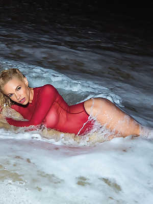 Dani Mathers in red see-through bodysuit getting wet