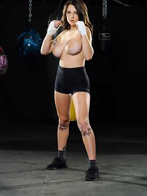 Gabbie Carter exposes her big breasts after a hard boxing workout