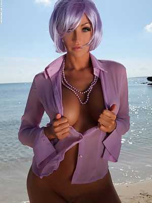 Holly only wearing purple on lonely beach