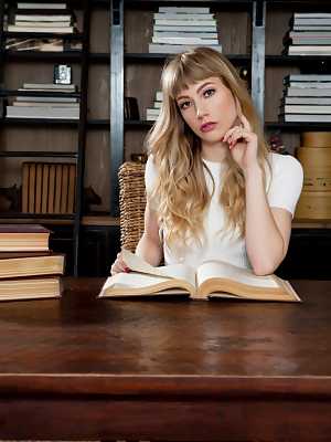 Cute bookworm Ivy Wolfe studies naked in the library