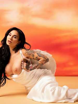 Joanna Angel is revealing all her tattoos wearing angel-wings