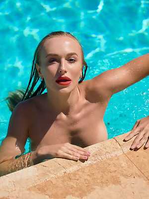 Aislin swims nude in her pool then indulges herself with her fingers