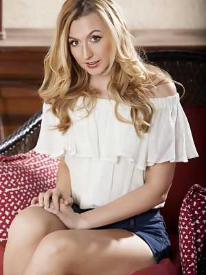 Alexa Grace strips out of her denim hot pants and white blouse