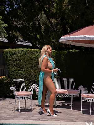 Ali Chanel showing her big breasts and ass by the pool