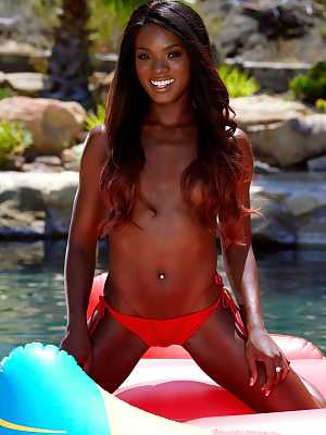 Ana Foxxx takes off her red bikini by the pool