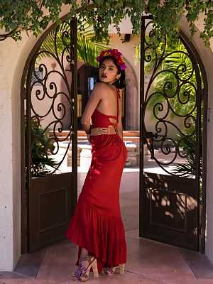 Angel Constance takes her red dress outside of her villa