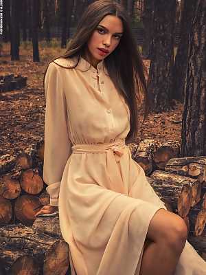 Alina stripping long dress in the woods