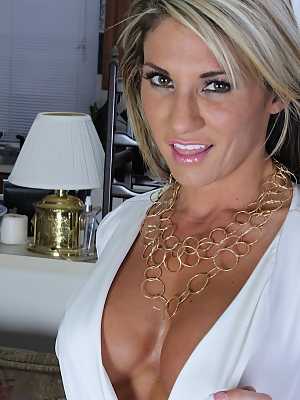 Pretty blonde milf with big tits spreading her pussy lips very wide