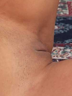 Latina solo girl Abby Melon unveiling large MILF tits and shaved vagina
