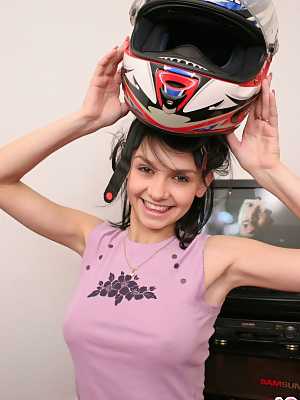Unbelievable sexy 18 year old Abigail posing with a big helmet