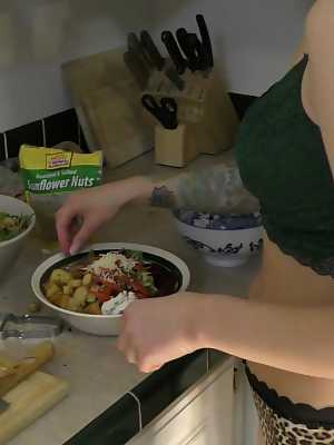 Solo girl Abigail Dupree sports a buzz cut while making a salad in pretties
