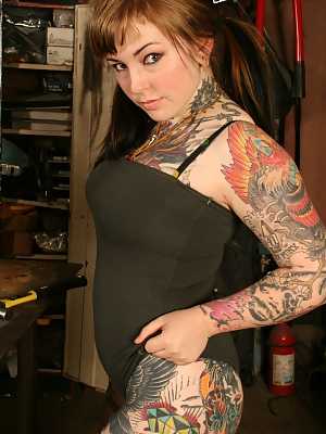 Inked beauty with perfect butt spreading & pleasing herself with awesome toys