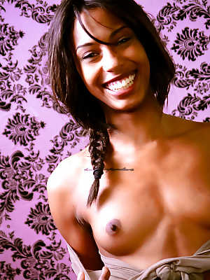 Smiley ebony floosie with pigtail uncovering her tiny titties