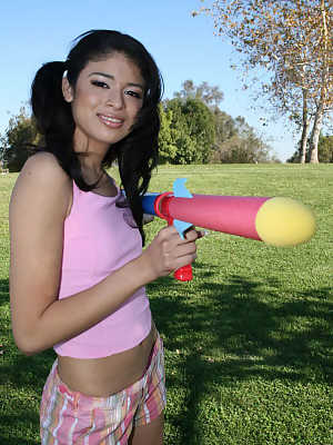 Skinny Latina Adriana Naveah gets her tiny tits exposed while playing outdoors