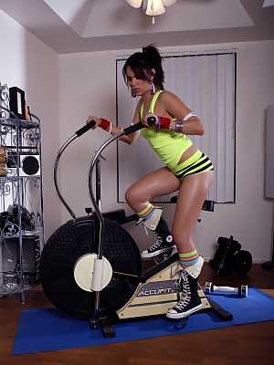 Sports girl Adrienne gets horny while exercising and toys her sexy pussy
