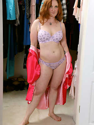 Over 30 redhead Aella Rae strokes her snatch after trying on lingerie