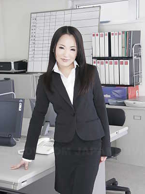 Japanese secretary Ai Mizushima models non nude at work in business attire