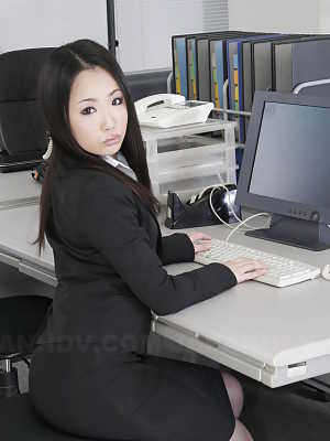 Japanese secretary Ai Mizushima models non nude at work in business attire