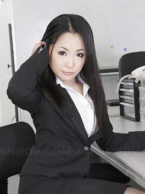 Japanese secretary Ai Mizushima models non nude at work in business attire