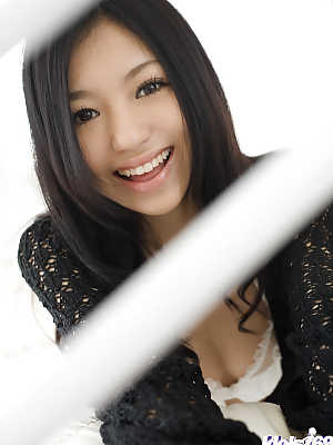 Pretty asian teenage vixen Aino Kishi uncovering her tiny curves