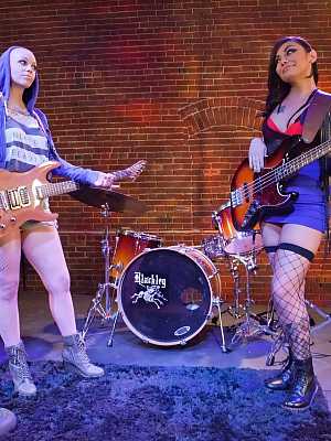 Ink queens in fishnet disrobe & fuck on stage at punk rock groups rehearsal