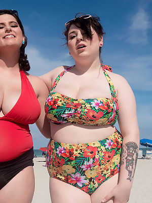 Mature BBW besties take out their massive big tits to play at the beach