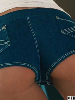 Nice young girl Trinity Moore slips booty shorts over her tight ass
