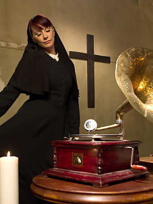 Slutty nun Maitresse Madeline Marlowe punishes and spanks a submissive priest