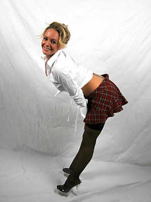 Naughty schoolgirl Alexis Stevens shows her hot ass under mini skirt