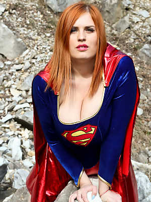 Thick redhead Alexsis Faye releases her giant tits from Superman osutfit