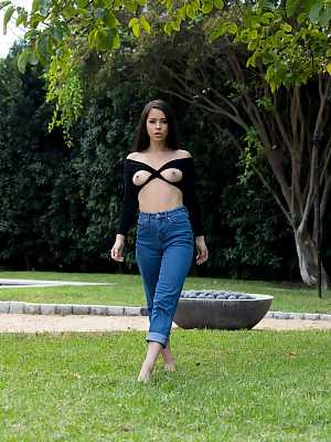 Brunette hottie in blue jeans Alina Lopez flashing her natural tits outdoors