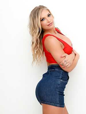 Hot blonde Alison Avery strikes great SFW poses in a denim miniskirt