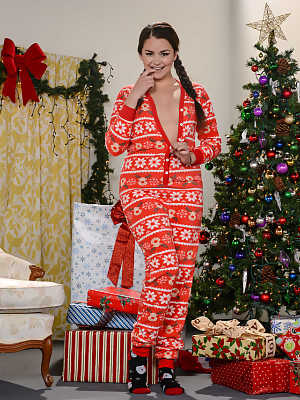 Adorable teen in Christmas pajamas Allie Haze reveals her anus with a buttplug